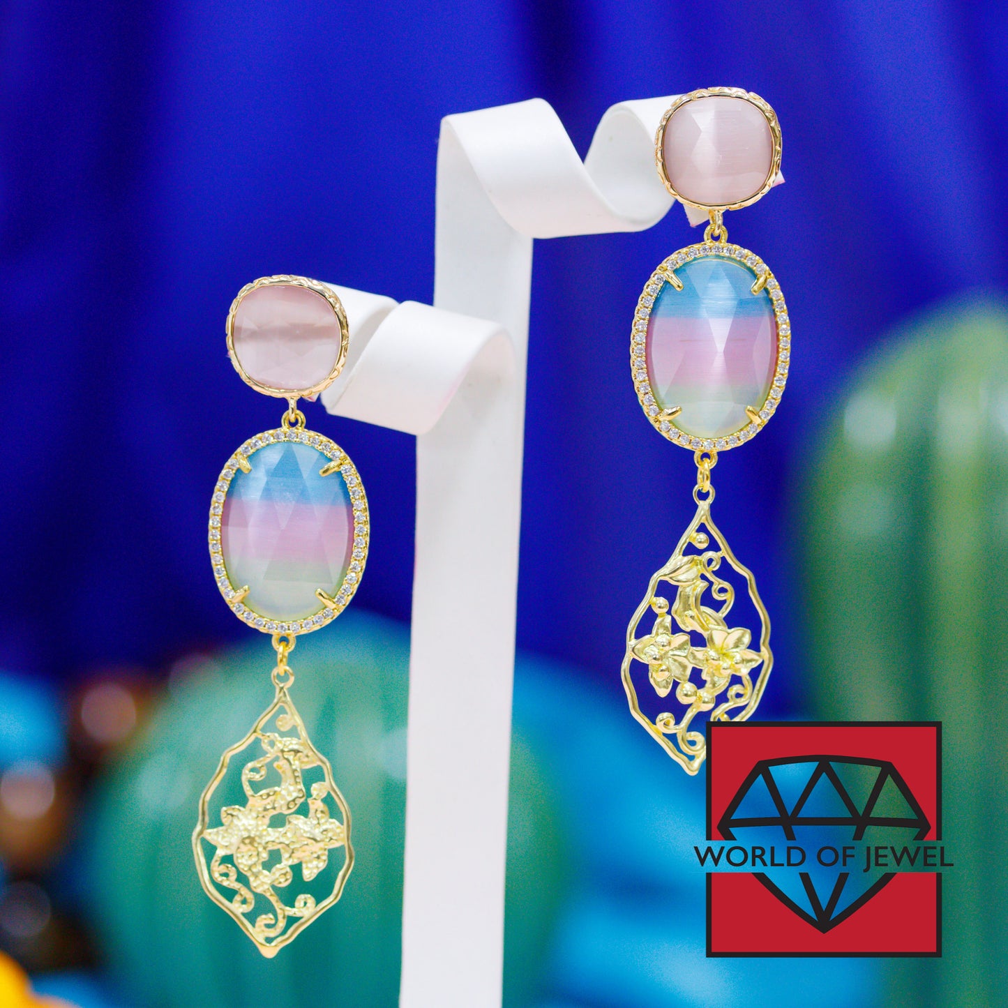 Elegant Bronze Earrings with Cat's Eye Cabochon and Gold Leaf